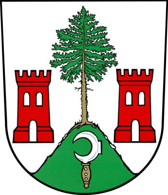 Ve stříbrném štítě na zeleném kopci jedle přirozené barvy provázená dvěma červenými věžemi s cimbuřím, prázdnou branou a dvěma obloukovými okny. V kopci vinařský nůž - kosíř přirozené barvy. Znak Dolní Dunajovice