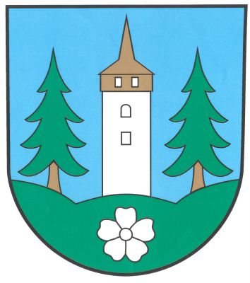 V modrém štítě vyrůstá ze zeleného trojvrší s prostředním nižším vrchem stříbrná věž s dřevěným podbitím a špičatou střechou přirozené barvy, provázená dvěma smrky přirozené barvy. V trojvrší stříbrný květ lnu. Znak Hajnice