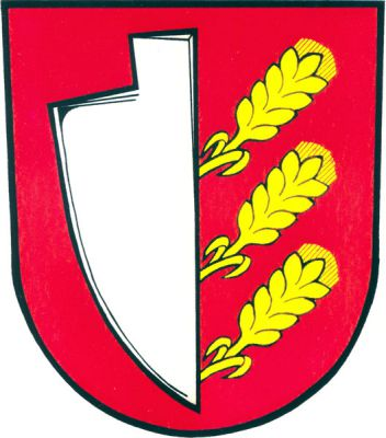 V červeném štítě vpravo stříbrná radlice, z níž šikmo nad sebou vynikají tři zlaté klasy. Znak Jakartovice