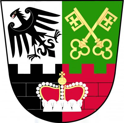 Ve stříbrno - zeleně polceném štítě dole černo - červeně polcená kvádrovaná hradba s knížecí korunou. V pravém poli kosmá černá orlice s červeným jazykem, v levém zkřížené zlaté klíče. Znak Líšná