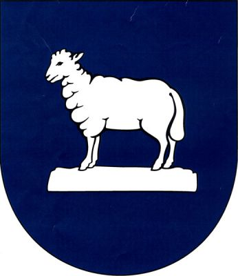 V modrém štítě na stříbrném plochém kameni stříbrná ovce. Znak Modrá
