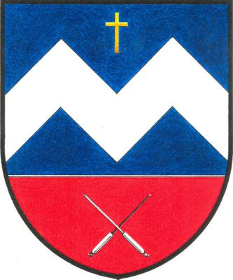 Modro-červeně sníženě dělený štít, v horním modrém poli třikrát lomené stříbrné břevno provázené zlatým latinským křížkem. V dolním poli zkřížené stříbrné sklářské píšťaly. Znak Moldava