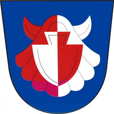 V modrém štítě v červeno-stříbrně polcené svatojakubské mušli čelně radlice opačných barev. Znak Oráčov