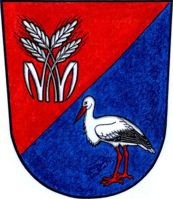 V červeno-modře šikmo děleném štítě nahoře čtyři proložené stříbrné obilné klasy, krajní s odkloněným listem, dole čáp přirozené barvy. Znak Pištín