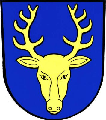 V modrém štítě zlatá jelení hlava. Znak Pražmo