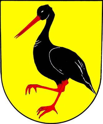 Ve zlatém štítě vykračující černý čáp s červenou zbrojí. Znak Rudná pod Pradědem