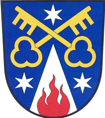 V modrém štítě snížený stříbrný hrot s červeným vyrůstajícím plamenem provázený dvěma stříbrnými hvězdami. Vše převýšeno zkříženými zlatými klíči, nahoře stříbrná hvězda. Znak Šimanov