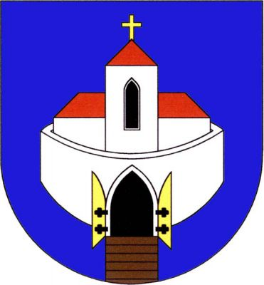 V modrém štítě za stříbrnou kruhovou hradbou s černou gotickou branou s otevřenými zlatými vraty stříbrná, červenou valbovou střechou krytá, podélná loď kostela a před ní uprostřed stříbrná věž s černým gotickým oknem a červenou stanovou střechou zakončenou zlatým křížkem. Z okraje paty štítu vede k bráně dřevěný most přirozené barvy. Znak Spořice