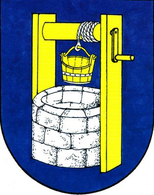 V modrém štítě stříbrná kvádrovaná okrouhlá studna se zlatým rumpálem a okovem visícím na stříbrném provazu. Znak Studenec