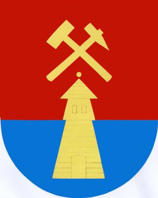 Ve sníženě červeno-modře děleném štítě roubená zvonice převýšená kosmým mlátkem šikmo podloženým želízkem, vše zlaté. Znak Suchovršice