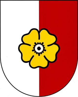 Ve stříbrno-červeně polceném štítě zlatý květ jabloně se stříbrným středem. Znak Temelín