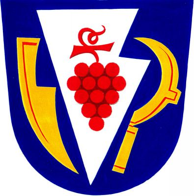 V modrém štítě stříbrná radlice s červeným vinným hroznem s ratolestí, provázená vpravo doleva obráceným krojidlem a vlevo vinařským nožem - kosířem, obojí zlaté. Znak Těmice