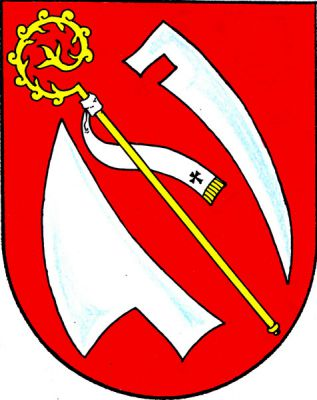 V červeném štítě kosmá zlatá berla závitem doleva se stříbrným sudariem, provázená nahoře kosmou kosou bez kosiště, dole kosmou vztyčenou radlicí, obojí stříbrné. Znak Valdíkov