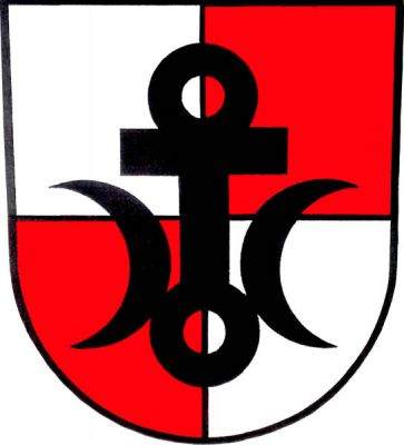 Ve stříbrno-červeně čtvrceném štítě antonínský kříž bez stupňů zakončený nahoře a dole dvěma prázdnými kruhy a provázený dvěma odvrácenými přiléhajícími půlměsíci, vše černé. Znak Velká Kraš