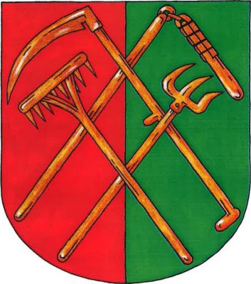 V červeno-zeleně polceném štítě zvýšeně zkřížené kosa a cep, dole přeložené hráběmi zkříženými s vidlemi, vše zlaté. Znak Znětínek